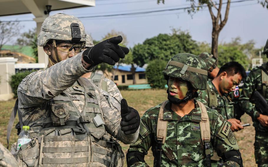U.S soldiers assigned to Alpha Company, 2nd Battalion, 3rd Infantry Regiment, 1-2 Stryker Brigade help the Royal Thai Army prepare an air assault exercise during Cobra Gold 16 in Lop Buri, Thailand, Feb. 13, 2016. Cobra Gold is part of Pacific Pathways, which strings together already established Army exercises with allies and partner nations throughout the Pacific.