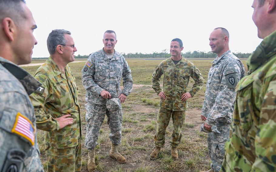 Brig. Gen. Brian Alvin, third from left, speaks with high ranking members of the 6th Royal Australian Regiment during Operation Hamel 15, part of Pacific Pathways 2015, near Rockhampton, Australia, July 9, 2015.