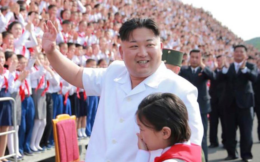 In this undated image from the Korean Central News Agency, North Korean leader Kim Jong Un arrives to attend "We Are the Happiest in the World," a performance by schoolchildren to celebrate the 70th anniversary of the Korean Children's Union.