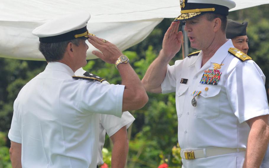 Maj. Gen. Bryan P. Fenton talks with a guest after a ceremony at Camp H. M. Smith, Hawaii, Thursday, June 9, 2016, where he took command of Special Operations Command, Pacific.