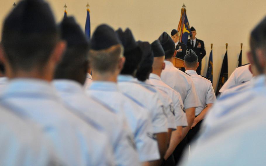 Rows of American airmen view a 31st Fighter Wing change-of-command ceremony Friday, June 10, 2016 at Aviano Air Base, Italy. Gen. Lance K. Landrum took command from Maj. Gen. Barre R. Seguin.
