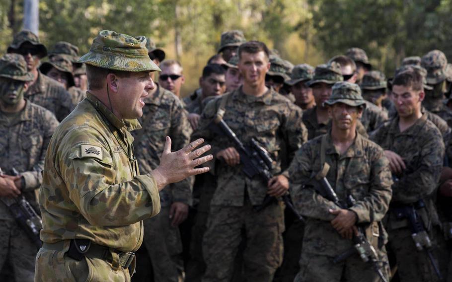 Lt. Col. Jim McGann, commanding officer of the Australian Army's Battle Group Waratah, 8th Brigade, thanks U.S. Marines and members of the Japan Ground Self-Defense Force for their training during Exercise Southern Jackaroo at Shoalwater Bay, Queensland, Australia, May 26, 2016.