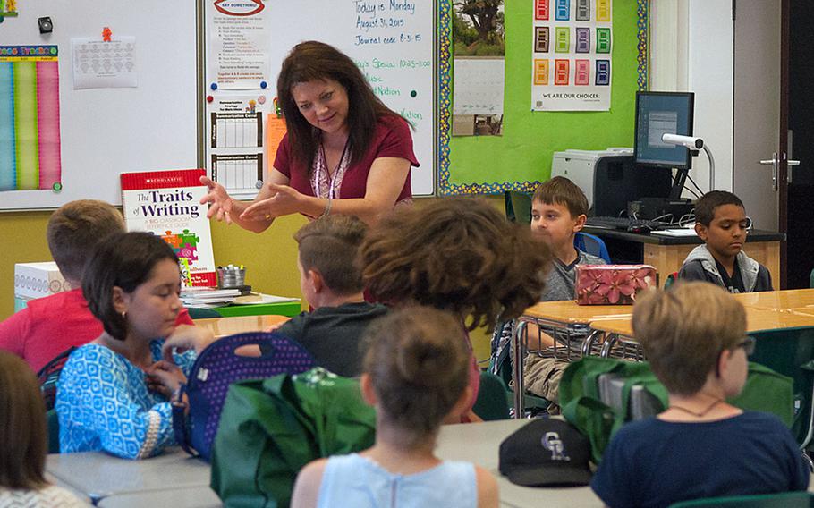 Terri Sobey, 5th grade teacher at Grafenwoehr Elementary, leads her new students through first-day introductions, Aug. 31, 2015. Military schools in Europe are hiring new community superintendents as part of restructuring intended to direct more staff and resources to the schools.