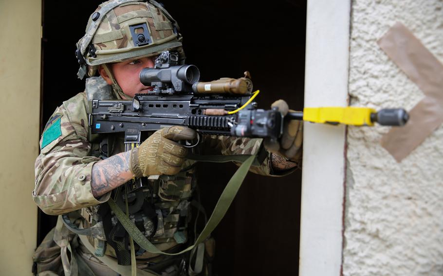 British army Pvt. Jack Wheeler of the Parachute Regiment takes part in the Swift Response 16 training exercise at Hohenfels Training Area in Germany on Friday June 19, 2016.  Analysts warn that a British vote to leave the EU also carries a series of potentially damaging security implications for the U.S. and its allies.