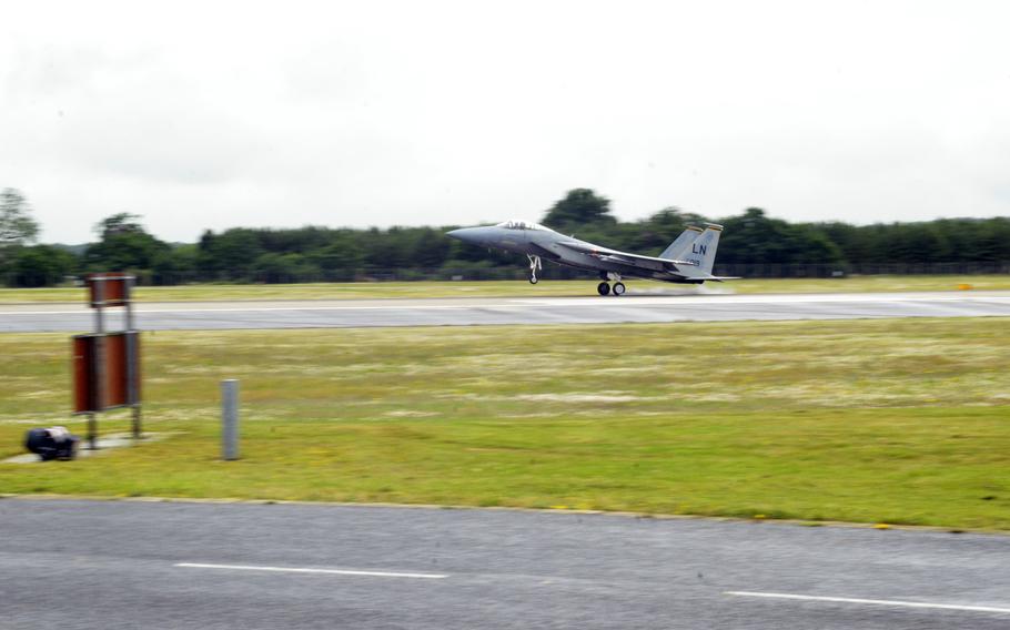 An F-15C Eagle of the 493rd Fighter Squadron lands at RAF Lakenheath during an Aviation Enthusiasts tour, Wednesday, June 22, 2016. This was the second time RAF Lakenheath invited amateur and professional photographers an opportunity to document aircraft up-close and in action.