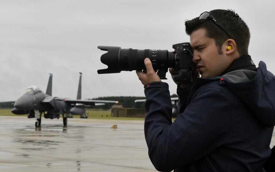 Photographer Matt Pullen documents an F-15E Strike Eagle of the 493rd Fighter Squadron during an Aviation Enthusiasts tour at RAF Lakenheath, Wednesday, June 22, 2016. This was only the second time photographers were allowed access to the flight line.
