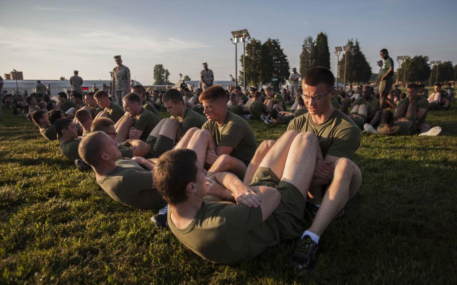 Officer Candidate School candidates undergo the physical fitness test at Marine Corps Base Quantico, Va., June 1, 2016. Changes for the physical and combat fitness tests are slated to take effect Jan. 1, 2017, while tweaks to the body composition program are already in place.