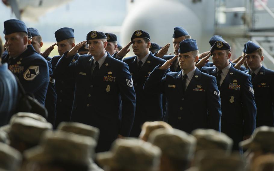 A formation presents Brig. Gen. Jon Thomas with a final salute during the 86th Airlift Wing's change-of-command ceremony at Ramstein Air Base, Germany, on Wednesday, Aug. 17, 2016.