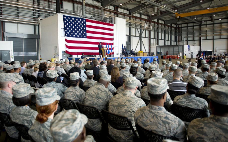 Audience members listen to remarks by Brig. Gen. Richard Moore, 86th Airlift Wing commander, during the wing's change-of-command ceremony at Ramstein Air Base, Germany, on Wednesday, Aug. 17, 2016.