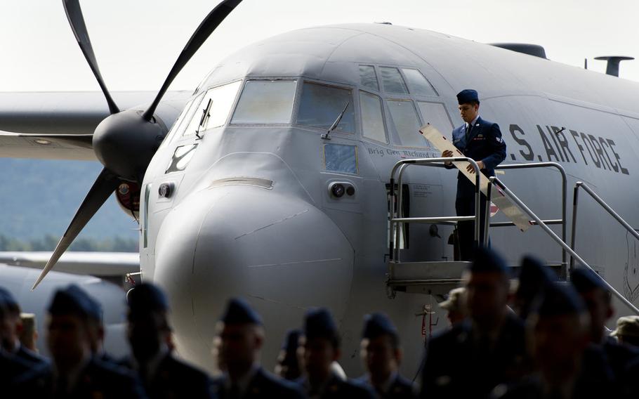 Brig. Gen. Richard Moore's name is unveiled on a C-130 during the 86th Airlift Wing's change-of-command ceremony at Ramstein Air Base, Germany, on Wednesday, Aug. 17, 2016. Moore is the new wing commander.