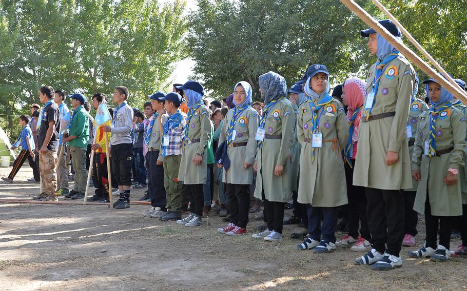 Boys and girls in Afghanistan's growing scouts program stand in formation on Sept. 8, 2016, waiting to begin a series of outdoor obstacle course activities as part of a camporee event, the first since the Soviet invasion in 1979.