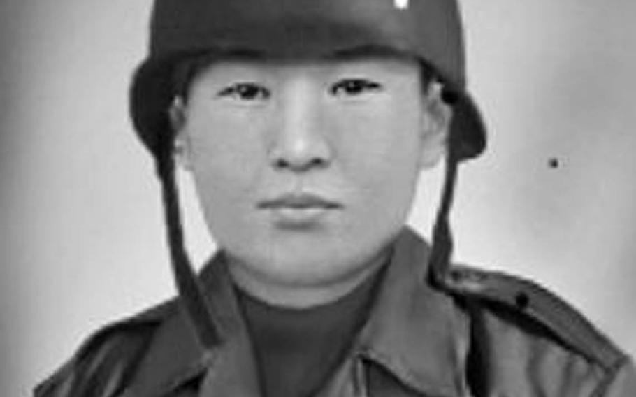 John Hong is pictured as a 17-year-old Korean army private in 1948. Two years later, he ended up stranded on the wrong side of the Han River after the U.S.-backed government fled south, blowing up a strategic bridge behind them.
