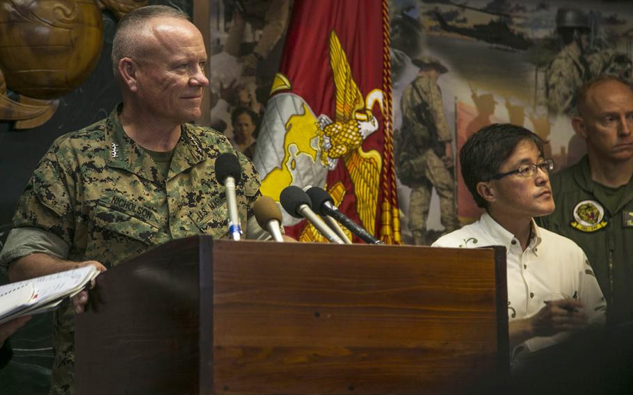 Lt. Gen. Lawrence Nicholson, III Marine Expeditionary Force commander, announces the resumption of AV-8B Harrier flights in Japan during a press conference at Camp Foster, Okinawa, Wednesday, Oct. 5, 2016. The jets were grounded after one of the aircraft inexplicably crashed off the island prefecture's eastern seaboard on Sept. 22.