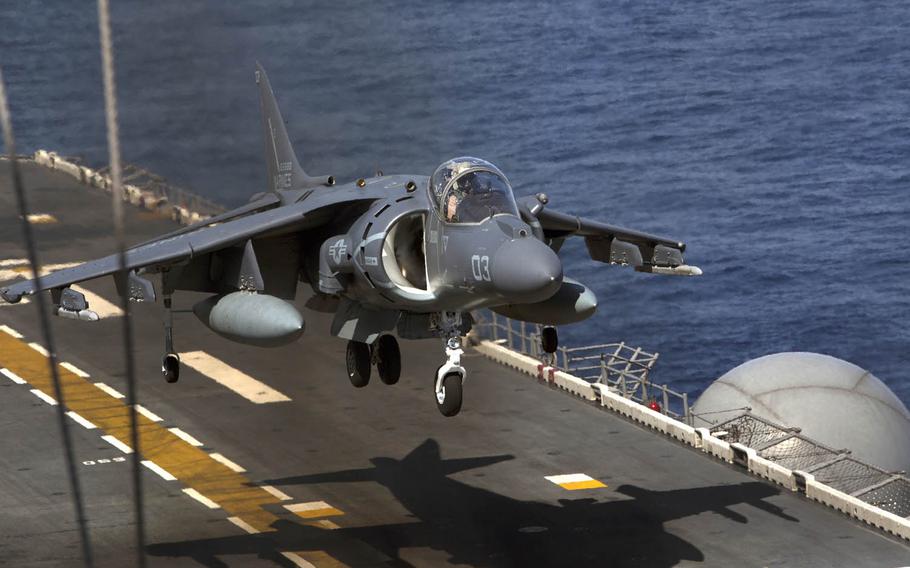 A Marine Corps AV-8B Harrier comes down for a landing on the flight deck of the USS Bonhomme Richard in 2015. One of the jets inexplicably crashed into the sea near Okinawa, Japan, Sept. 22, 2016.