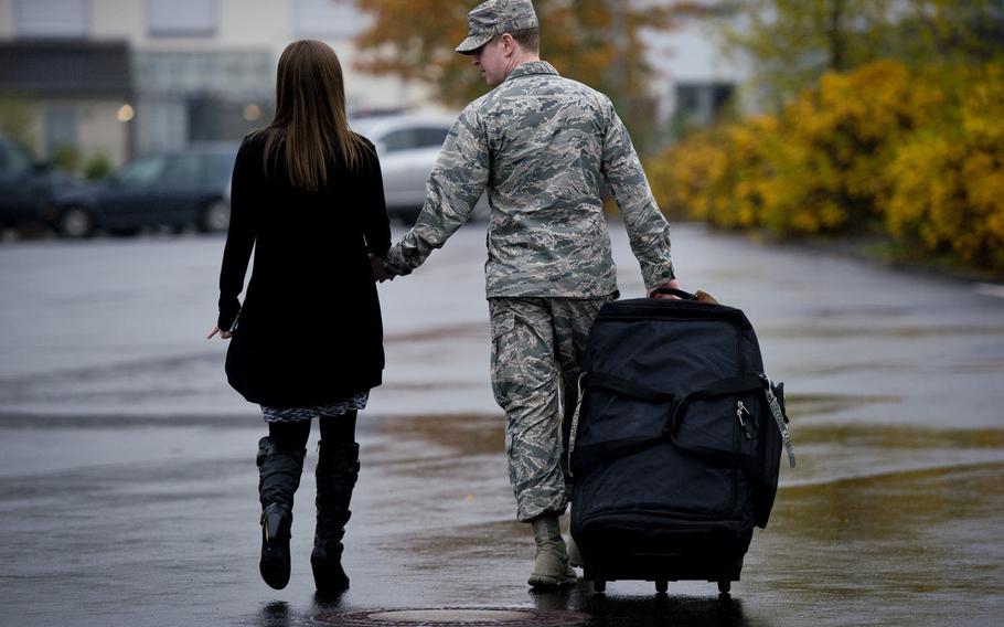 An airman from the 606th Aircraft Control Squadron heads home after returning to Spangdahlem Air Base, Germany, on Thursday, Oct. 20, 2016.