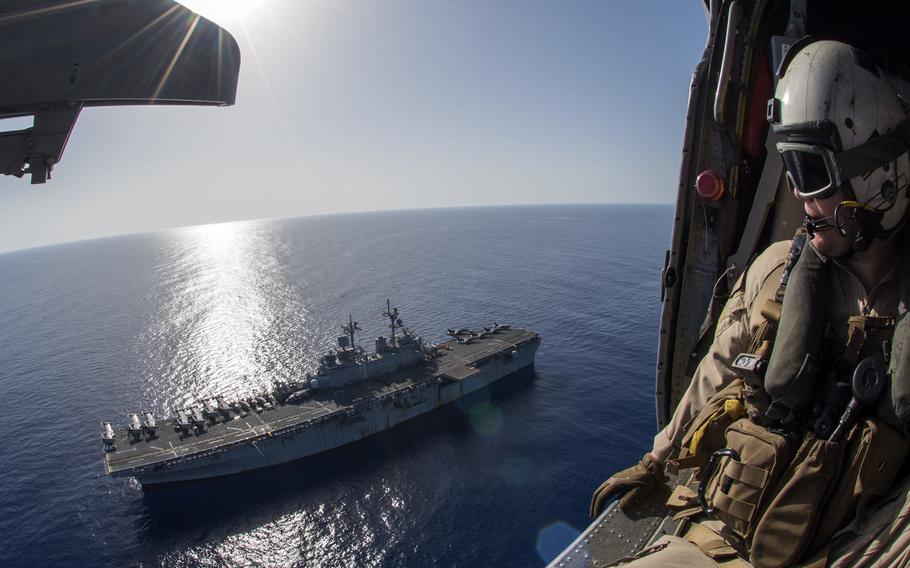 Petty Officer 1st Class Matthew Estep watches the amphibious assault ship USS Wasp transit the Mediterranean Sea on Oct. 12, 2016. The Wasp is deployed with the Wasp Amphibious Ready Group to support maritime security operations and theater security cooperation efforts in the U.S. 6th Fleet area of operations.