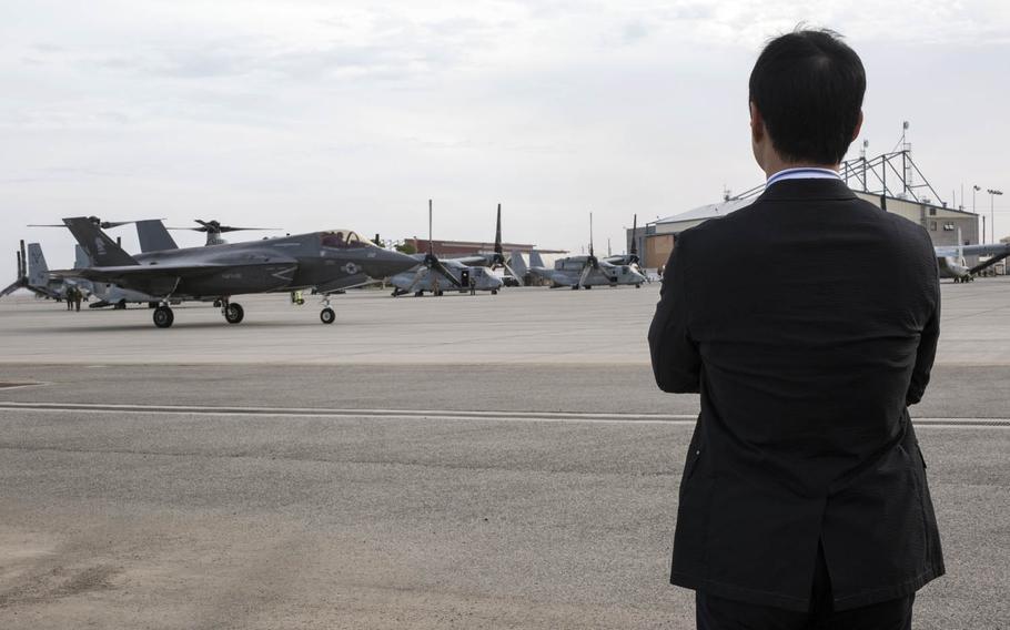 Yoshihiko Fukuda, mayor of Iwakuni, Japan, observes an F-35B Lightning II at Marine Corps Air Station Yuma, Ariz., Monday, Oct. 24, 2016. U.S. officials notified the Japanese government last week that 16 of the stealth aircraft will be stationed at Marine Corps Air Station Iwakuni next year.