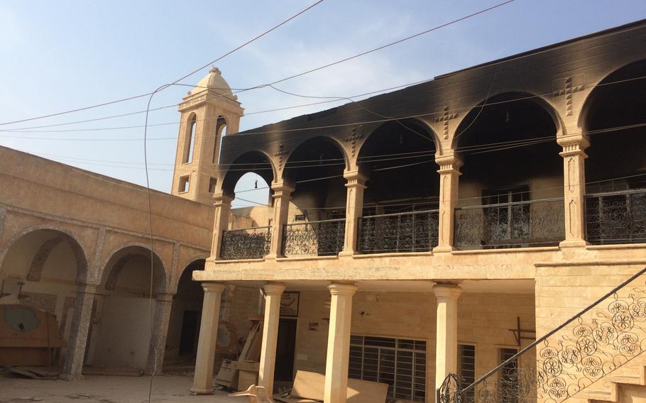 A damaged church in the center of Bartella, a Christian Village east of Mosul.