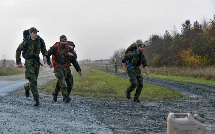 Norwegian soldiers participate in the 12-mile Ruck March event as part of the European Best Sniper Squad Competition at the 7th Army Training Command's Grafenwoehr training area in Germany on Thursday, Oct. 27, 2016. Norway took first place in the four-day European Best Sniper Squad Competition, which was sponsored by U.S. Army Europe.