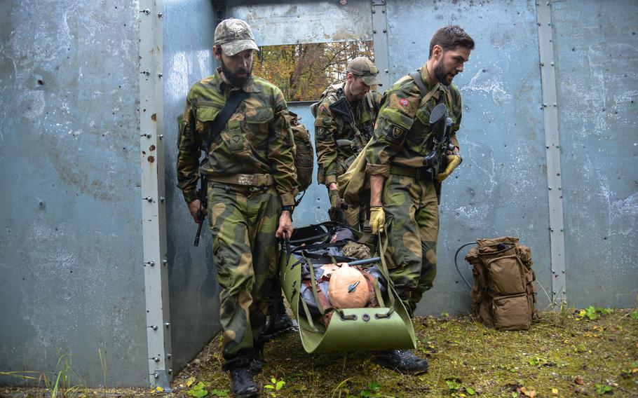 Norwegian soldiers work together to complete the Casualty Evacuation event during the European Best Sniper Squad Competition on Tuesday, Oct. 25, 2016. The four-day competition was held at the 7th Army Training Command's Grafenwoehr training area in Germany. None of the five U.S. units participating finished in the top three. Sweden and Belgium took second and third place in this year?s event in which 11 nations participated.