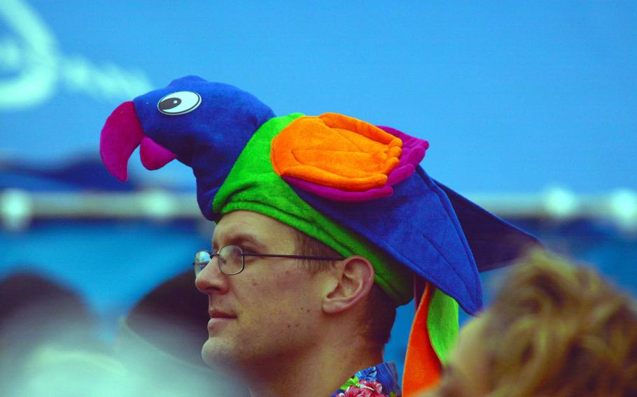 A "parrothead," the name given to Jimmy Buffett's devoted fans, watches Buffett and the Coral Reefer Band play at Yokosuka Naval Base, Japan, Sunday, Oct. 30, 2016.