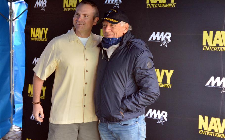 Jimmy Buffett, right, poses with a fan during a backstage meet-and-greet at Yokosuka Naval Base, Japan, Sunday, Oct. 30, 2016. Buffett performed free concerts for servicemembers at Yokosuka and on Okinawa to cap his 2016 tour.