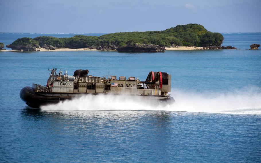 A landing craft air cushion departs amphibious assault ship USS Bonhomme Richard during an equipment offload at White Beach Naval Facility in Okinawa, Japan, Friday, Oct. 28, 2016. Amphibious operations with Japan will be a major focus during the Keen Sword exercise, which runs through Nov. 11.