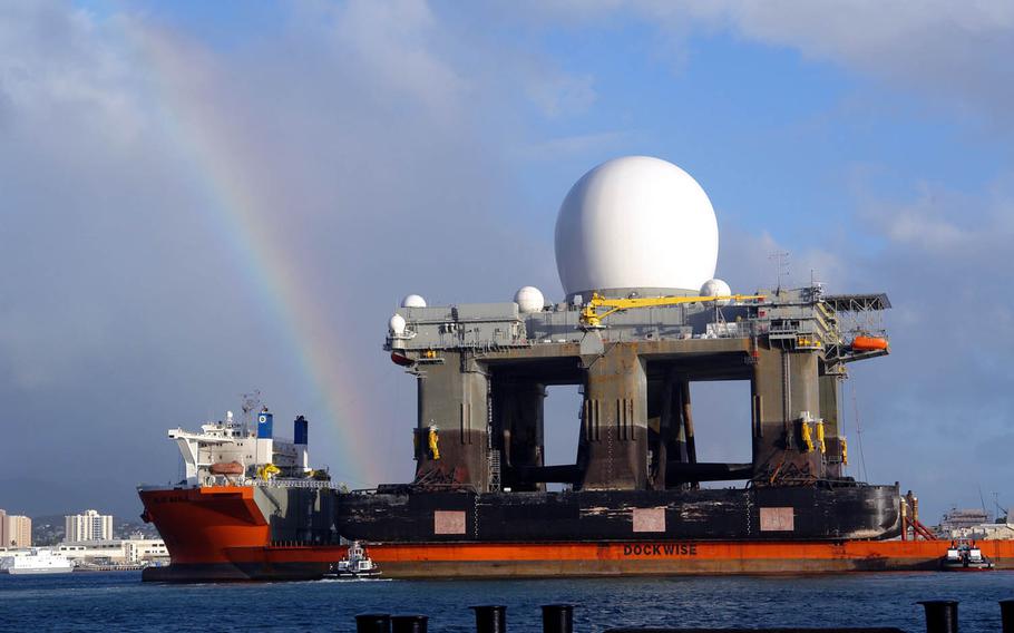 The heavy lift vessel MV Blue Marlin enters Pearl Harbor, Hawaii, with the Sea-Based X-Band Radar after a 15,000-mile journey from Corpus Christi, Texas, in 2006. SBX is a combination of the world's largest phased-array X-band radar carried aboard a mobile, ocean-going semi-submersible oil platform.