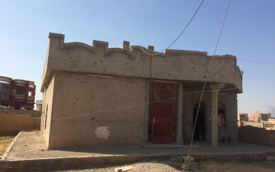 Villages on the east side of the Tigris River south of Mosul are almost completely abandoned.Some buildings have been completely destroyed by the fighting to push out Islamic State militants. Others, like this one seen on Saturday, Oct. 29, 2016,  are riddled with bullet holes.