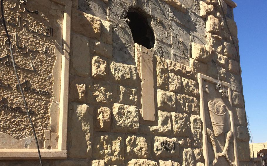 The Islamic State group has damaged art at St. Barbara Church in the village of Kermlis, east of Mosul, Iraq, seen here on Wednesday, Nov. 2, 2016.