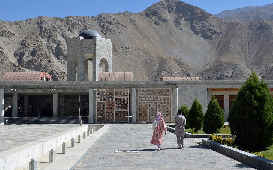 Visitors stroll along the gardens near the tomb of Ahmad Shah Massoud, an Afghan military fighter known as the 'Lion of Panjshir' who battled the Soviets and the Taliban, near the town of Bazarak in Panjshir Valley on Oct. 13, 2016. Massoud was assassinated in 2001, days before the Sept. 11 attacks in the United States. The monument surrounding his tomb, which includes gardens and fountains, is not yet complete.