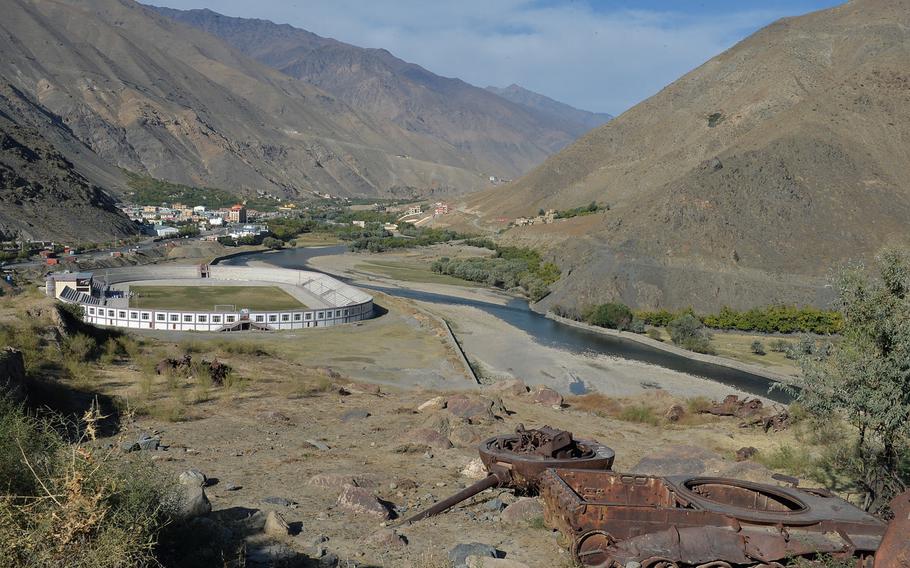 A destroyed tank rusts on a hillside overlooking the Panjshir Valley town of Parakh on Oct. 13, 2016.