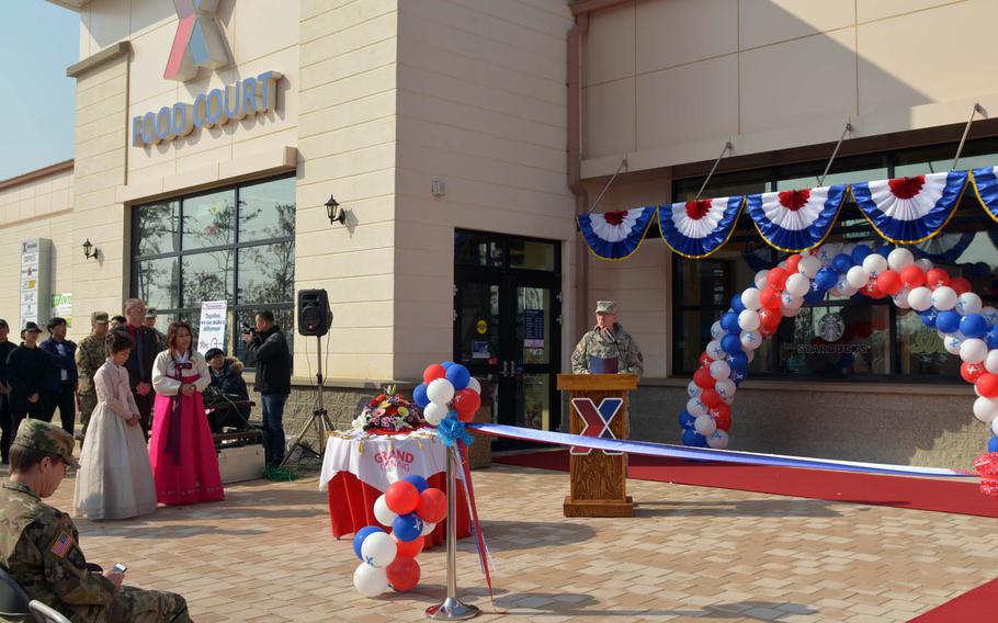 Maj. Gen. James Walton, director of transformation and restationing for U.S. Forces Korea, speaks during a ribbon-cutting ceremony to mark the opening of a $6.2 million minimall, Tuesday, Nov. 8, 2016. The Army and Air Force Exchange Service facility is part of a massive expansion of Camp Humphreys as the military relocates most of its forces south of Seoul in coming years.