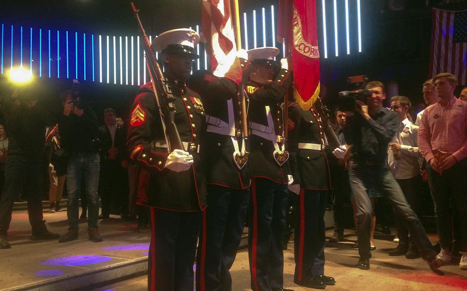 Members of the Frankfurt consulate Marine security detail act as color guard during the playing of national anthems during an election-night party on Tuesday, Nov. 8, 2016. Hundreds of Germans and Americans gathered at the Gibson Club in downtown Frankfurt to watch election results come in live overnight.