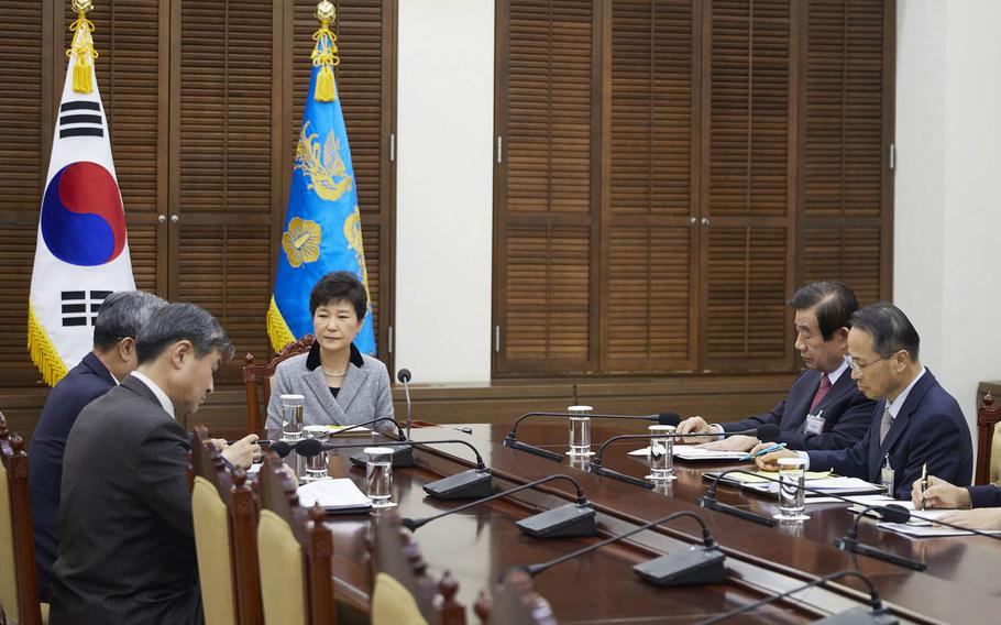 South Korean President Park Geun-hye receives a briefing from her National Security Council on Wednesday, Nov. 9, 2016, in Seoul to discuss the ramifications of the U.S. presidential election. U.S. President-elect Donald Trump reportedly promised to maintain Washington's security commitment to South Korea in a phone call the next day with Park.