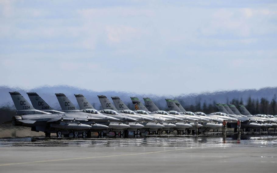 Air Force F-16 Fighting Falcons assigned to 121st Fighter Squadron, Joint Base Andrews, Md., and 112th Fighter Squadron, Toledo Air National Guard Base, Ohio, stand by for launch during drills last year at Eielson Air Force Base, Alaska.