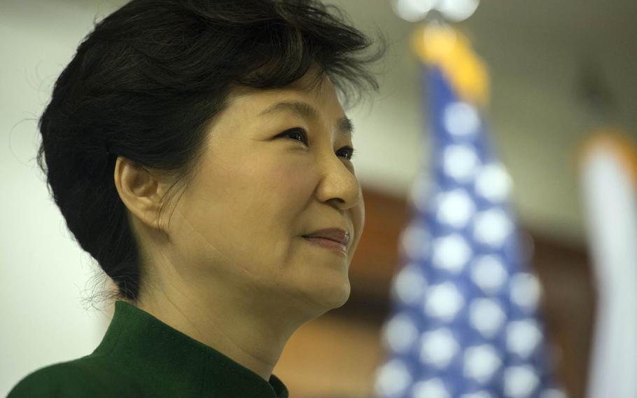 South Korean President Park Geun-hye speaks during a visit to the Pentagon in 2015. Park will meet with South Korea's main opposition leader Tuesday after legislative leaders agreed to appoint a special prosecutor to investigate an influence-peddling scandal threatening her grip on power.