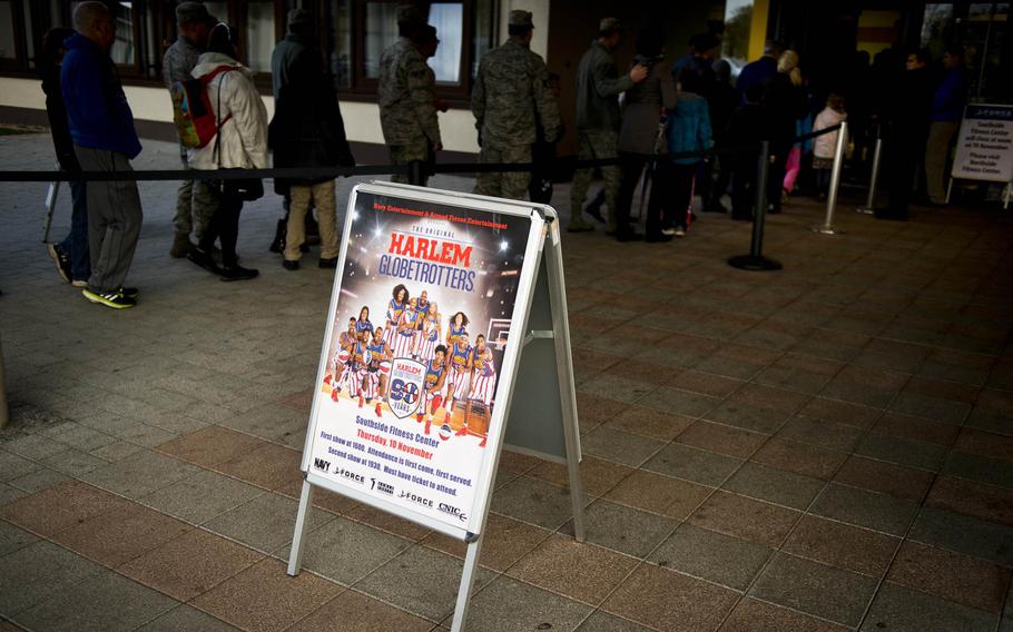A crowd lines up to see the Harlem Globetrotters at Ramstein Air Base, Germany, on Thursday, Nov. 10, 2016.