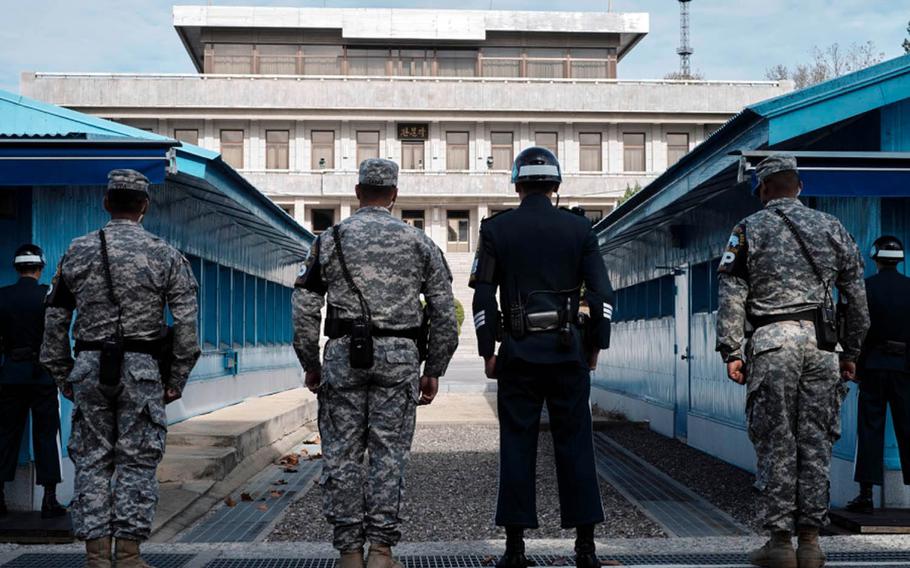 U.S. and South Korean guards stand at the Joint Security Area in the Demilitarized Zone between North and South Korea, Nov. 1, 2015. The BBC World Service will launch a daily radio program in North Korea as part of its biggest expansion since the 1940s.