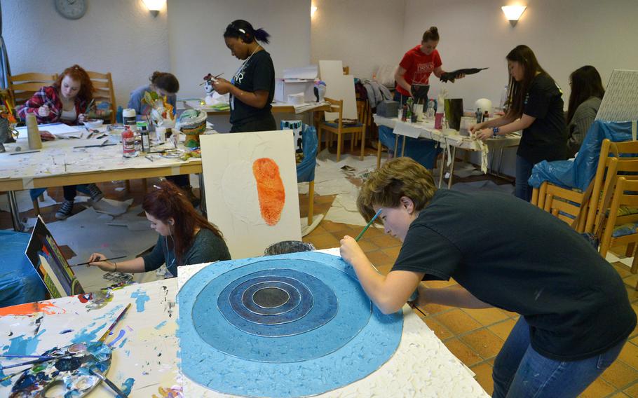 Artists work on their projects in the mixed media workshop at Creative Connections, Tuesday, Nov. 15, 2016. Creative Connections is an annual weeklong DODEA-Europe performing and visual arts symposium for high school students.