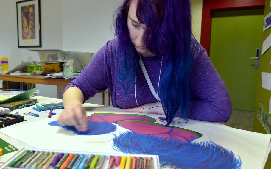 Ansbach's Madi Johnson works on a piece in the oil pastels workshop at this year's DODEA-Europe Creative Connections in Oberwesel, Germany, Tuesday, Nov. 15, 2016.