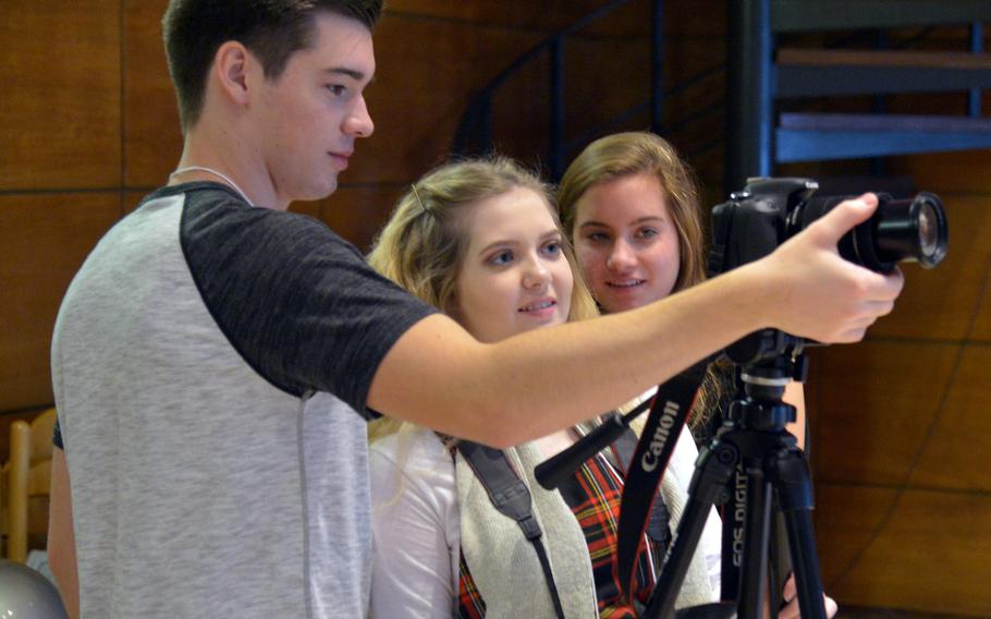 Ramstein's Colton Hodges, Annabelle Miss and Hannah Marshall, from left, of the video production workshop focus on the musical theater students at this year's DODEA-Europe Creative Connections, Tuesday, Nov. 15, 2016.