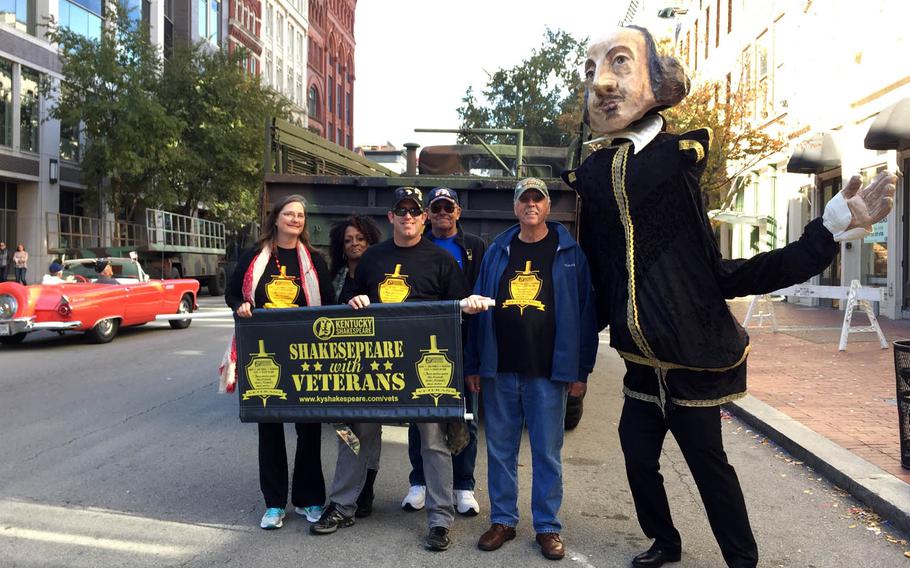 Members of Shakespeare With Veterans, a Kentucky-based theater troupe, pose during a recent Veterans Day parade in Louisville. The group aims to provide "the opportunity for camaraderie and a higher sense of purpose that represents what veterans loved most during military service."