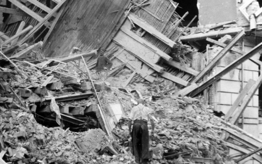 In this photo from the book "The Bombing of Wiesbaden, 1941-1945," by Thomas Weichel, a Wiesbaden resident picks through the rubble of his residence on Kaiser-Friedrich-Ring following an Allied bombing run on July 28, 1944. Wiesbaden, while not destroyed to the extent of other major German cities, was repeatedly bombed by American and British planes in the final years of the war.