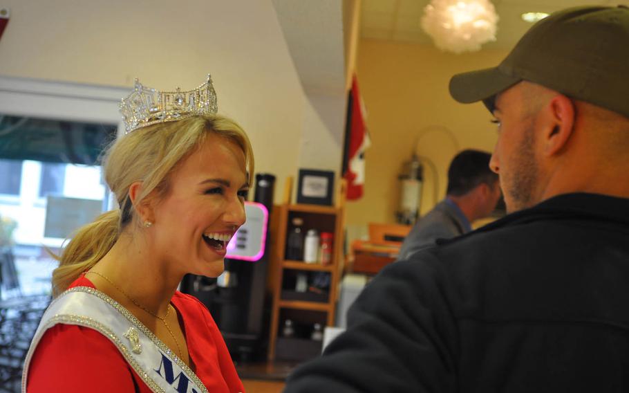 Savvy Shields, Miss America 2017, shares a laugh with Army Sgt. Alex Cuervo at the USO Warrior Center at Landstuhl Regional Medical Center, Germany on Friday, Nov. 25, 2016. Shields visited LRMC on Friday with Patrick Murphy, the under secretary of the Army, following several stops at locations in the Middle East earlier this week to visit U.S. troops.