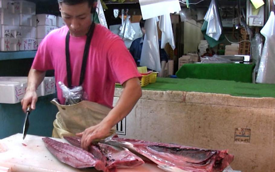 Tsukiji’s inner market is an exciting area for tourists to view and photograph the fish, but it’s also an area where they could interfere with professionals at work.