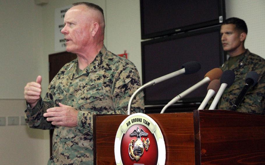 Lt. Gen. Lawrence Nicholson, III Marine Expeditionary Force commander, speaks with reporters at Camp Foster, Okinawa, about an MV-22 Osprey crash off the coast of Okinawa, Wednesday, Dec. 14, 2016.