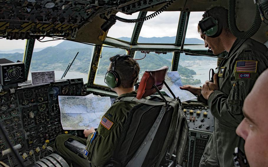 C-130H navigators from the 36th Airlift Squadron at Yokota Air Base, Japan, confirm the flight path over Shikoku Prefecture during Keen Sword drills in November.