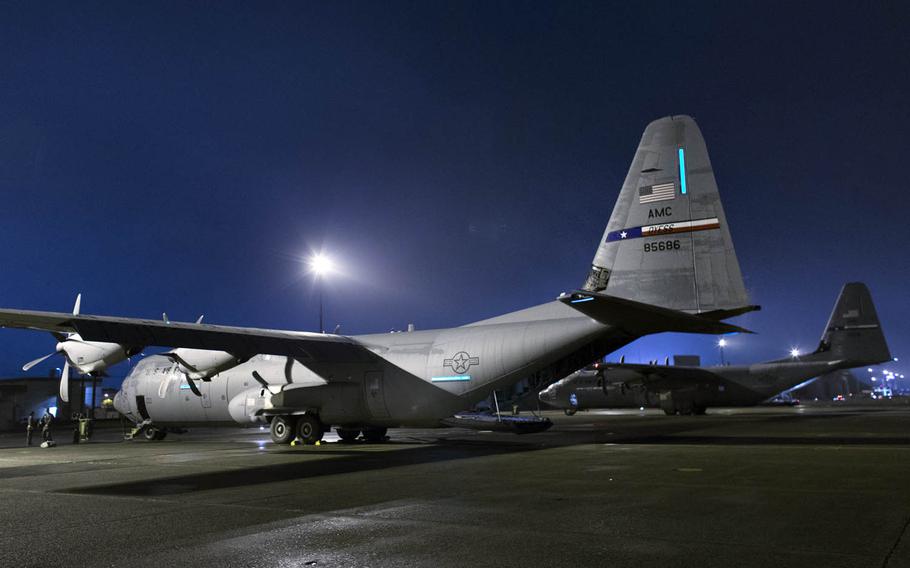 C-130J Super Hercules cargo planes sit at Yokota Air Base, Japan, in July. Three of the aircraft from Dyess Air Force Base, Texas, traveled to Yokota to aid in the transition from the C-130 Hercules to the J model.