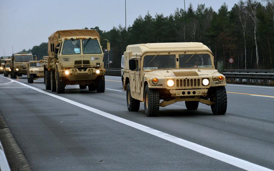 A convoy of vehicles of the 3rd Armored Brigade Combat Team, 4th Infantry Division drives along Autobahn A7 near Hannover, Germany, Tuesday, Jan. 10, 2017, on the way to Poland.